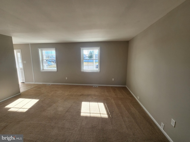 view of carpeted spare room