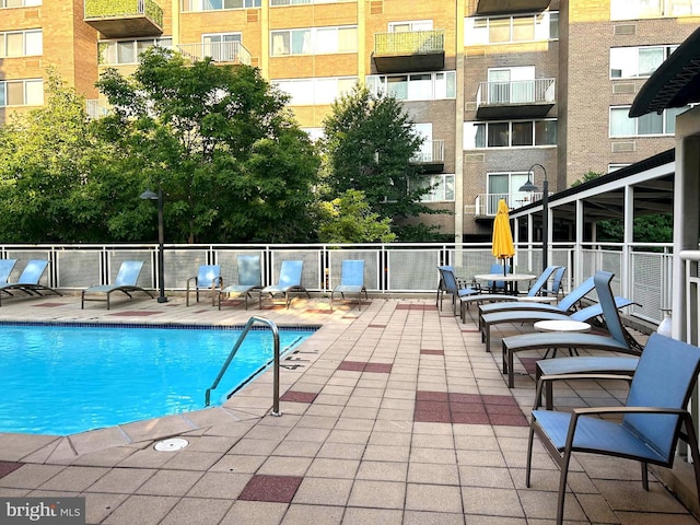 view of pool with a patio area