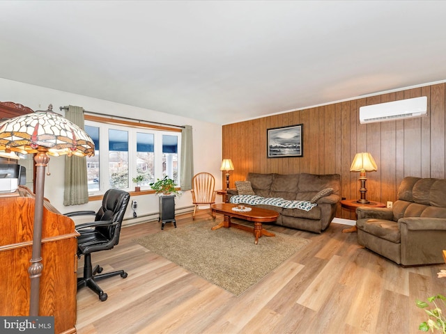 living room with an AC wall unit, wooden walls, and light hardwood / wood-style flooring