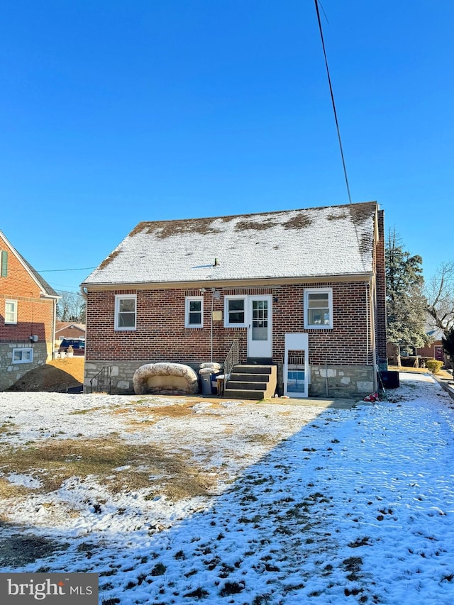 view of snow covered property