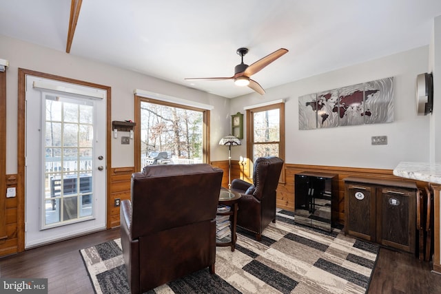 office space with ceiling fan and dark wood-type flooring