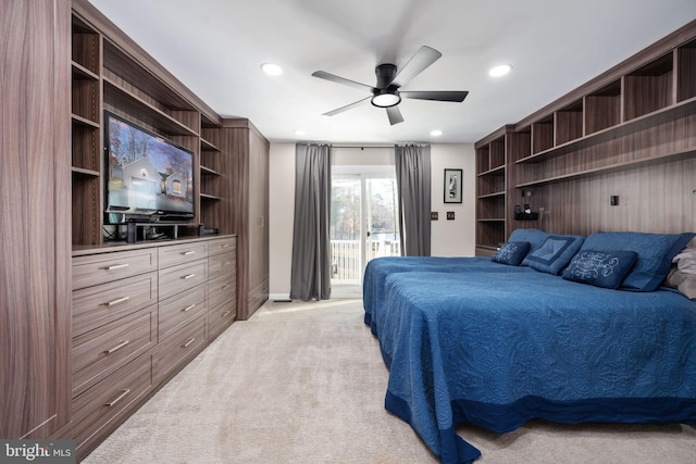 carpeted bedroom featuring ceiling fan and access to exterior