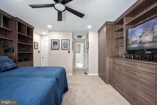 carpeted bedroom with ceiling fan