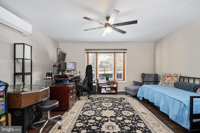 home office featuring ceiling fan, dark wood-type flooring, and a wall unit AC