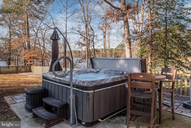 view of patio with a hot tub