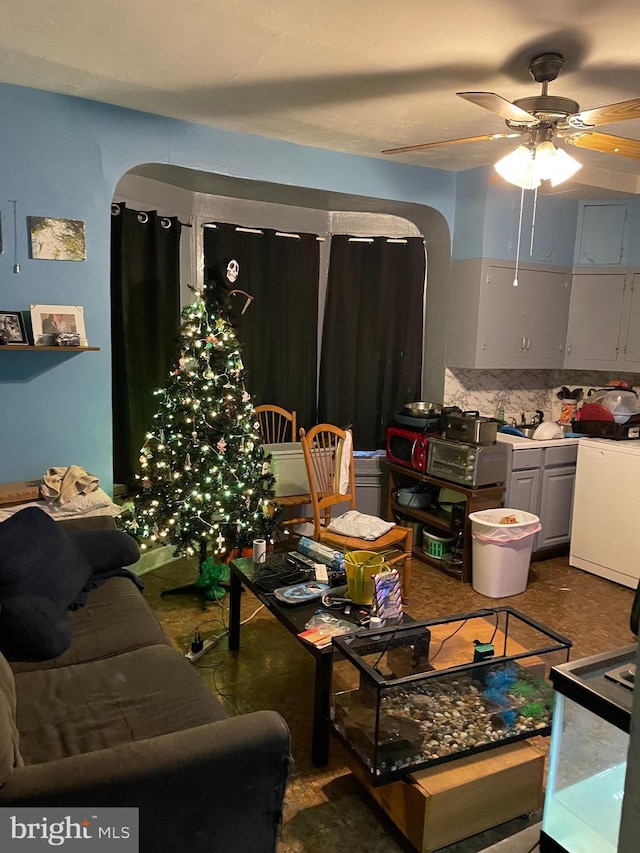 interior space featuring ceiling fan