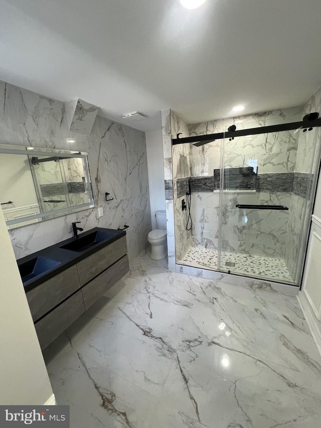 full bath featuring a marble finish shower, marble finish floor, toilet, and stone wall