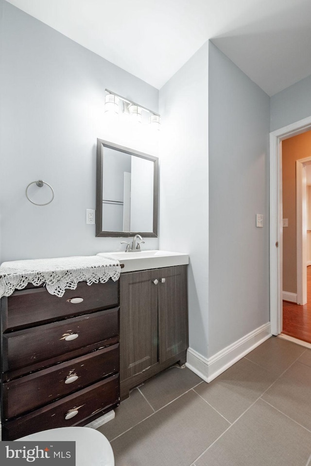 bathroom featuring tile patterned floors and vanity