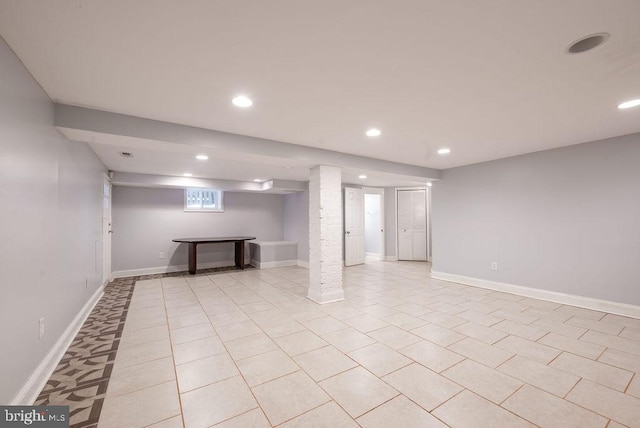 basement featuring light tile patterned floors