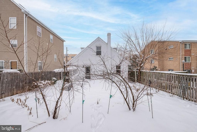 view of yard covered in snow