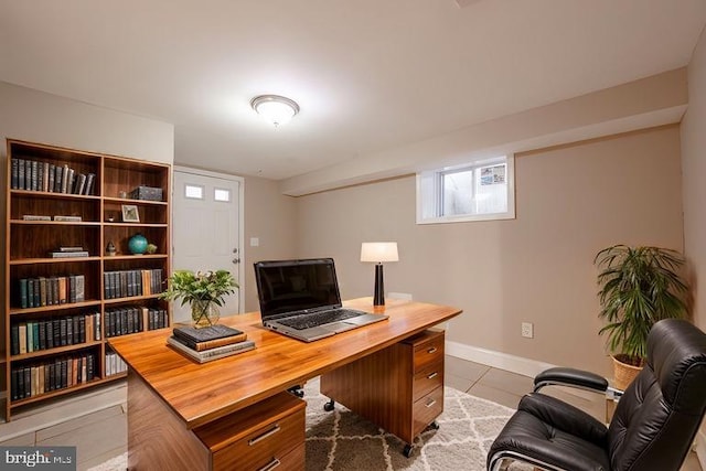 home office with light tile patterned floors