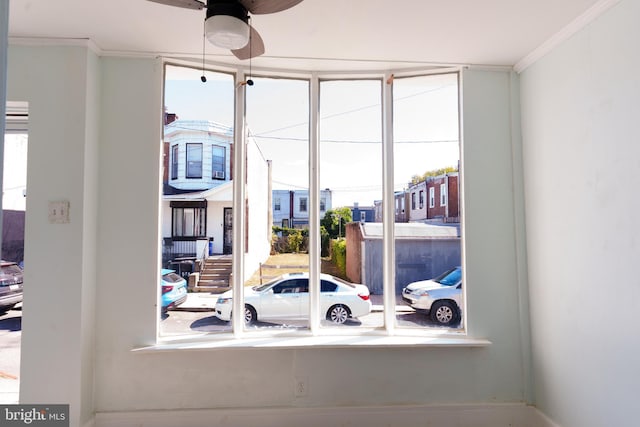 details with ceiling fan and crown molding