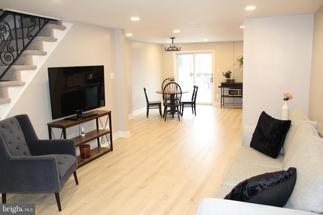 living room with light hardwood / wood-style floors