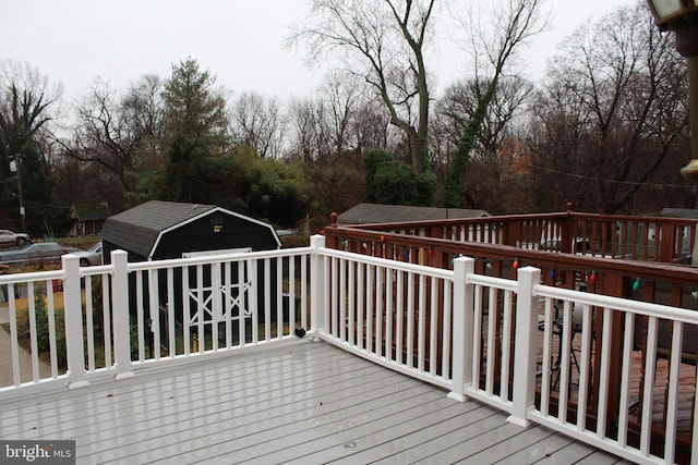 deck featuring a storage shed