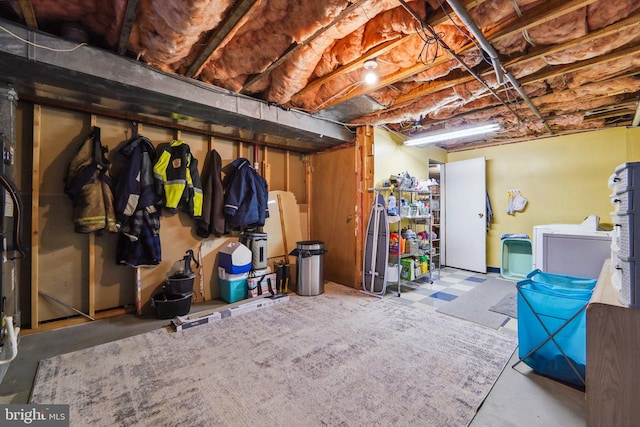 basement featuring washer and clothes dryer