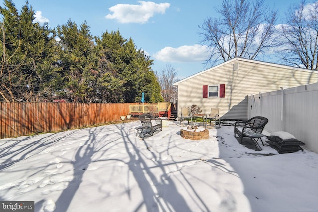 view of patio / terrace with a fire pit