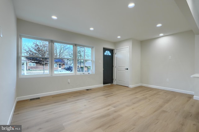 empty room featuring light hardwood / wood-style floors