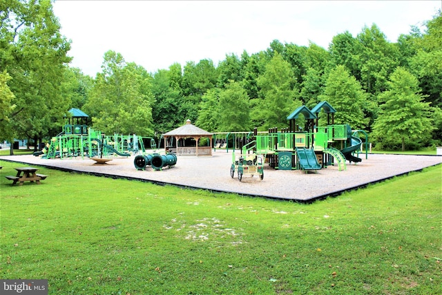 view of play area featuring a gazebo and a yard