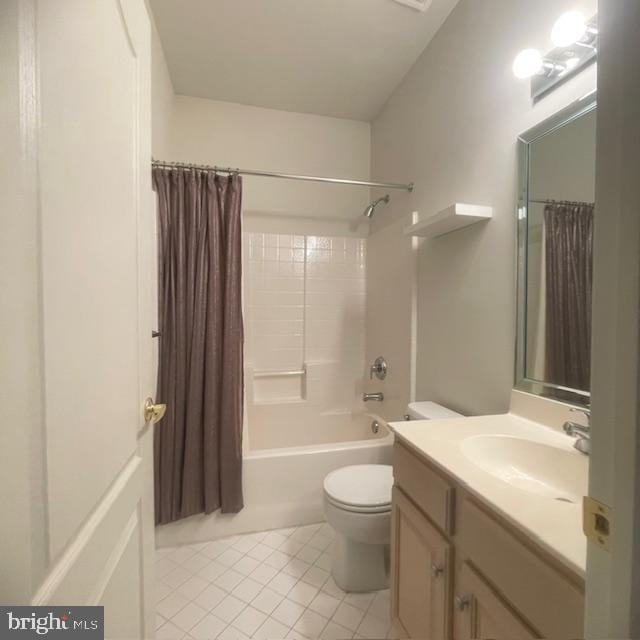 full bathroom with vanity, tile patterned flooring, shower / bathtub combination with curtain, and toilet