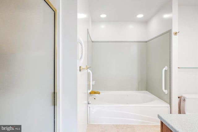 bathroom with tile patterned flooring, vanity, and shower with separate bathtub