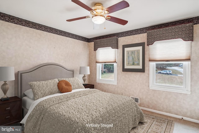 bedroom featuring ceiling fan