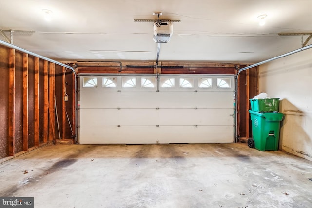 garage featuring a garage door opener