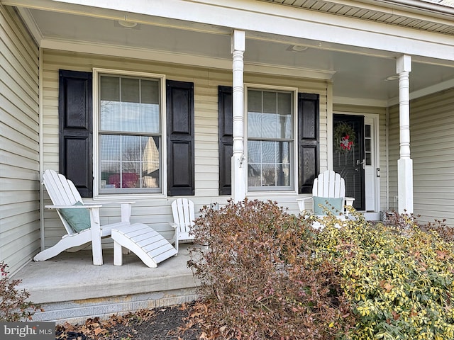 doorway to property with a porch