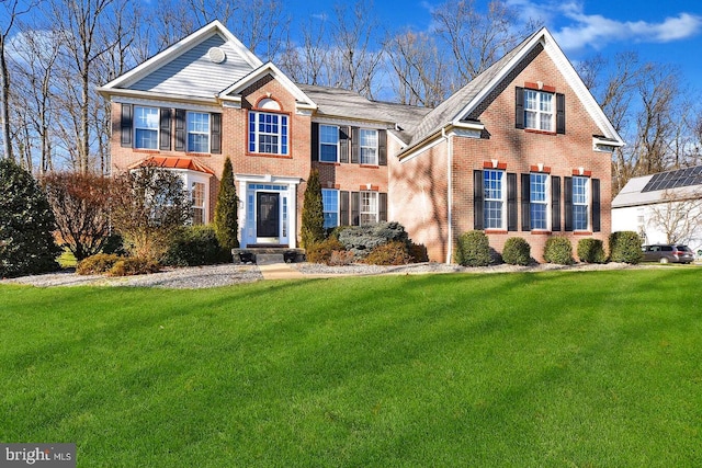 view of front of house featuring a front lawn