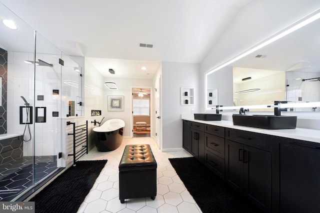 bathroom featuring separate shower and tub, ceiling fan, tile patterned flooring, and vanity