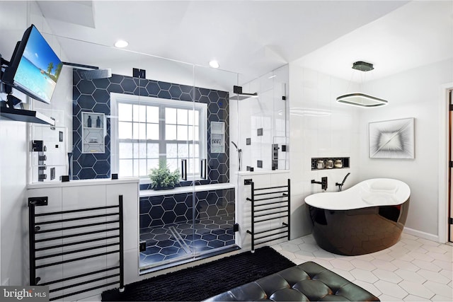 bathroom with plus walk in shower and tile patterned floors