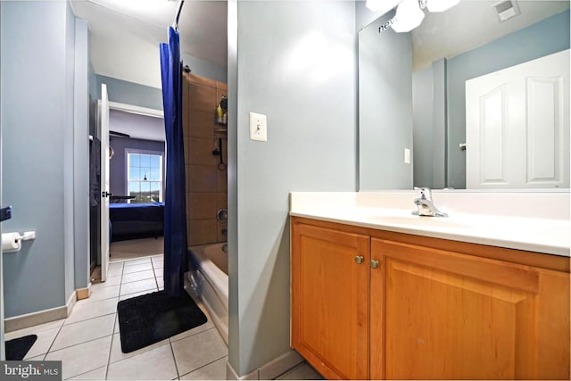 bathroom featuring shower / bath combination with curtain, vanity, and tile patterned floors