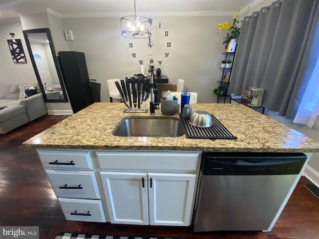 kitchen featuring white cabinetry, dishwasher, and a kitchen island with sink