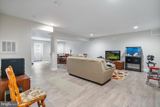 living room featuring light hardwood / wood-style floors