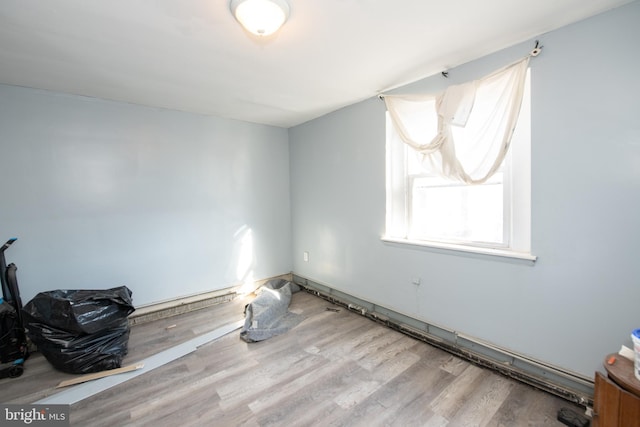 empty room featuring light hardwood / wood-style floors