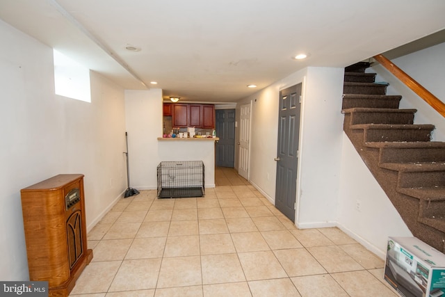 kitchen featuring light tile patterned flooring