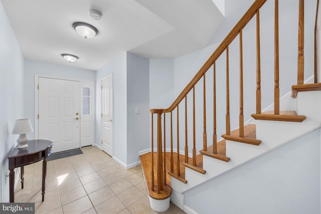 view of tiled foyer entrance