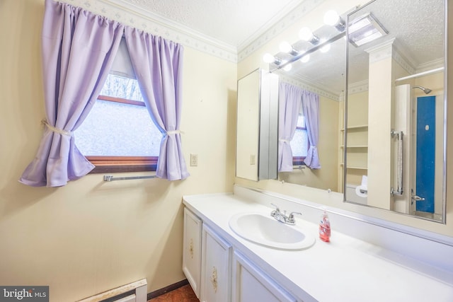 bathroom featuring vanity, crown molding, a textured ceiling, and walk in shower