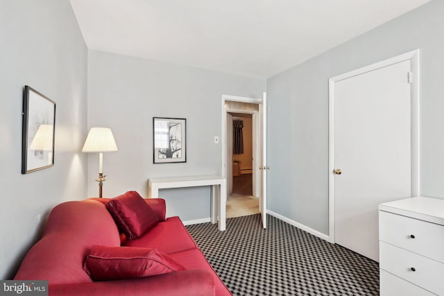 living area featuring carpet floors