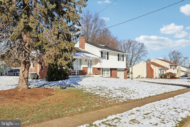 view of front of home with central air condition unit