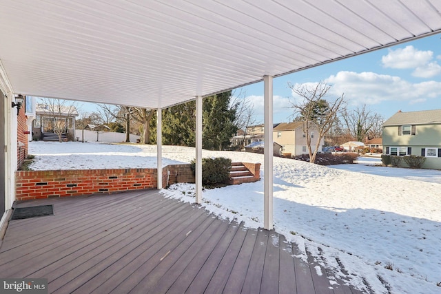 view of snow covered deck