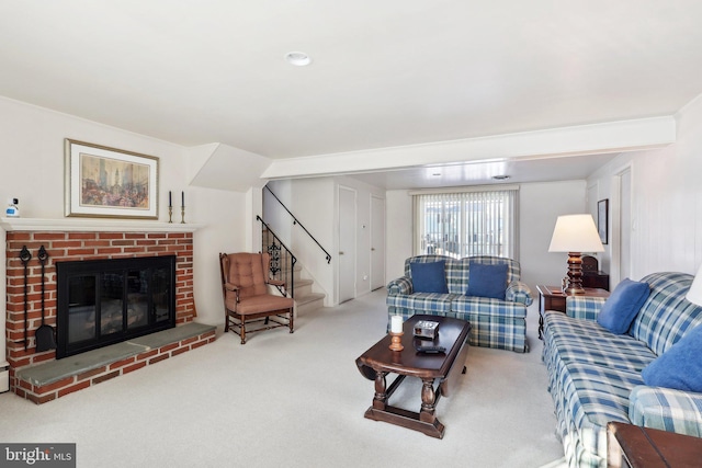 living room featuring carpet flooring and a fireplace