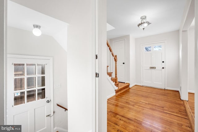 foyer with hardwood / wood-style flooring