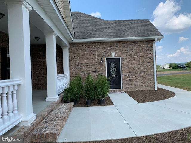 entrance to property with covered porch