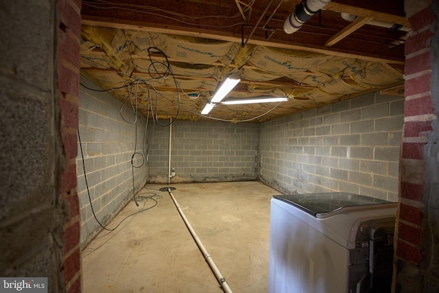 basement featuring refrigerator