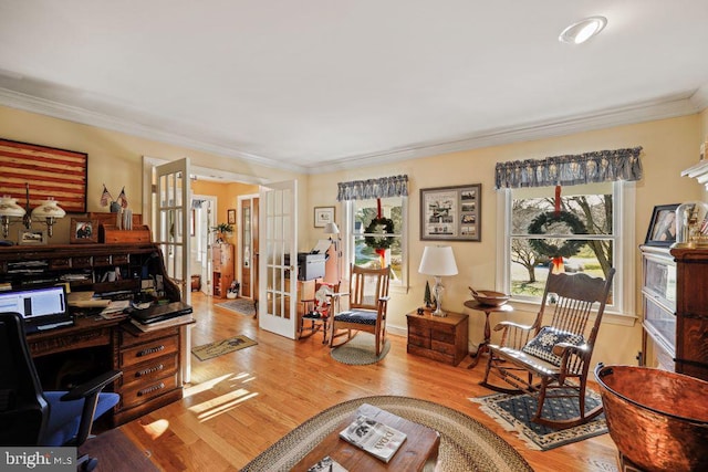 office space with wood-type flooring, ornamental molding, and french doors