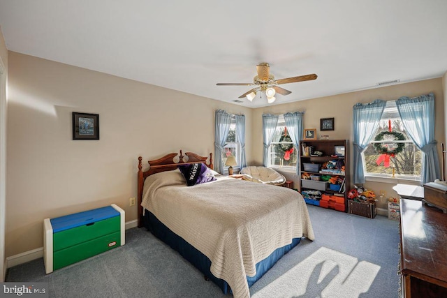 carpeted bedroom with ceiling fan