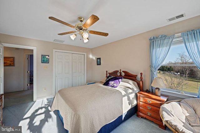 bedroom featuring carpet, a closet, and ceiling fan