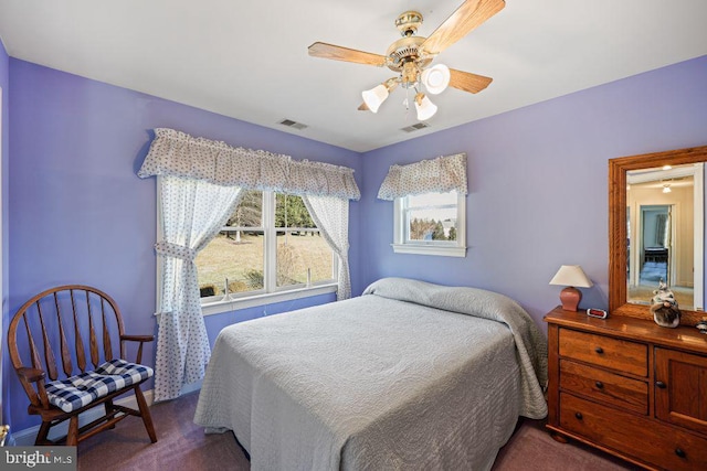 carpeted bedroom with ceiling fan