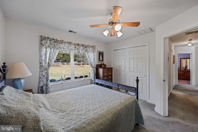 bedroom featuring carpet flooring, a closet, and ceiling fan