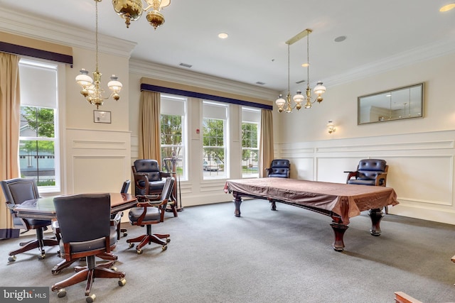 rec room featuring plenty of natural light, an inviting chandelier, and carpet floors